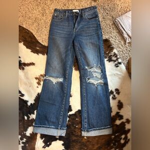 Women’s distressed straight leg jean